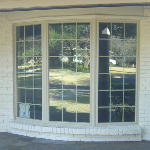 Cedar Trimmed Marvin Wood Windows at the Tropphy Club Texas overlooking the 9th green