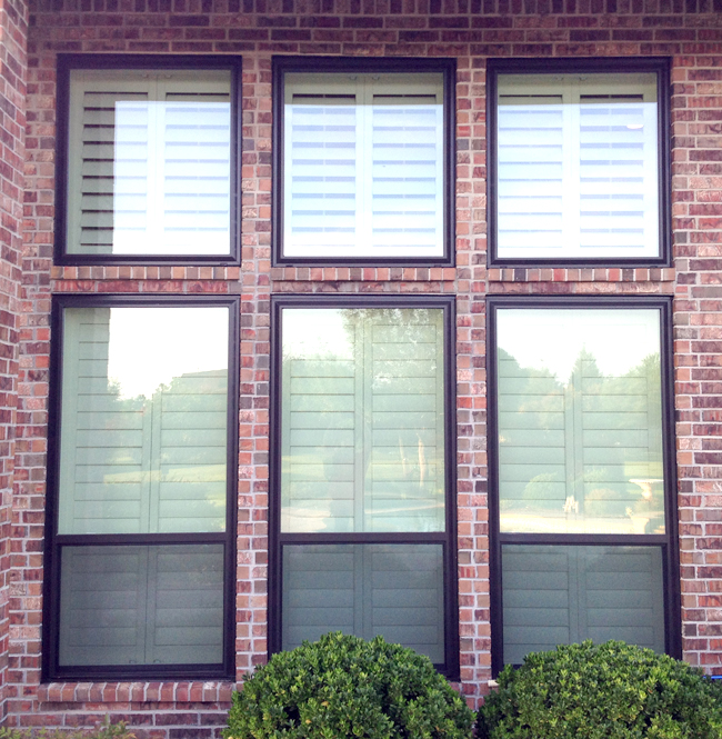 Vinyl Windows can come as bronze replacement windows now with white interiors and a factory painted exterior.