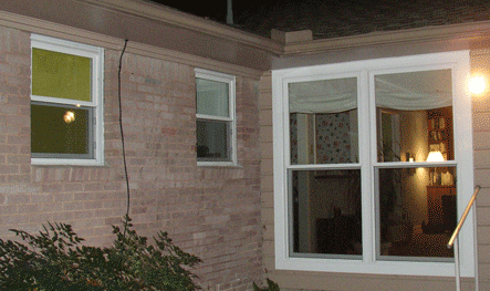 Full wrap on vinyl replacement windows where old aluminum builders grade windows were.