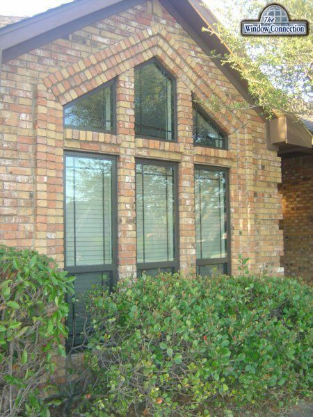 Don Young Thermally Broken Aluminum Single Hung Replacement Windows in Bronze With Prarie Lite Grids  in Dallas Texas