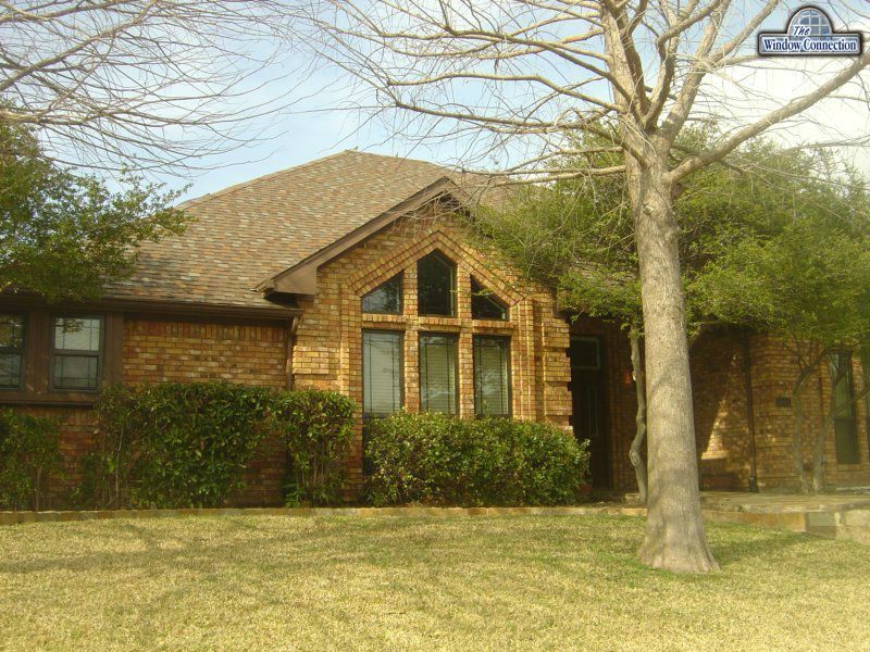 Don Young Thermally Broken Aluminum Single Hung Replacement Windows in Bronze With Prarie Lite Grids  in Dallas Texas