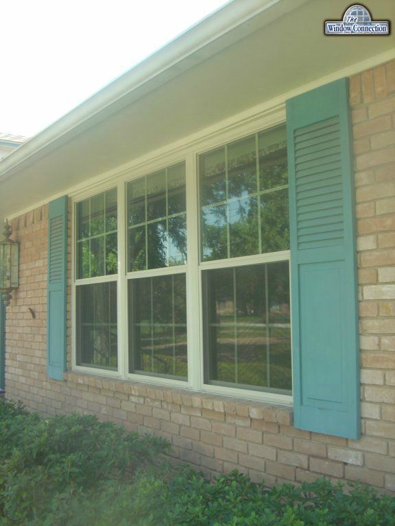 Triple Single Hung Alside Mezzo Vinyl Replacement Windows in Beige with Grids