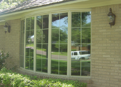 Jeldwen slim line vinyl replacement windows in a bow window